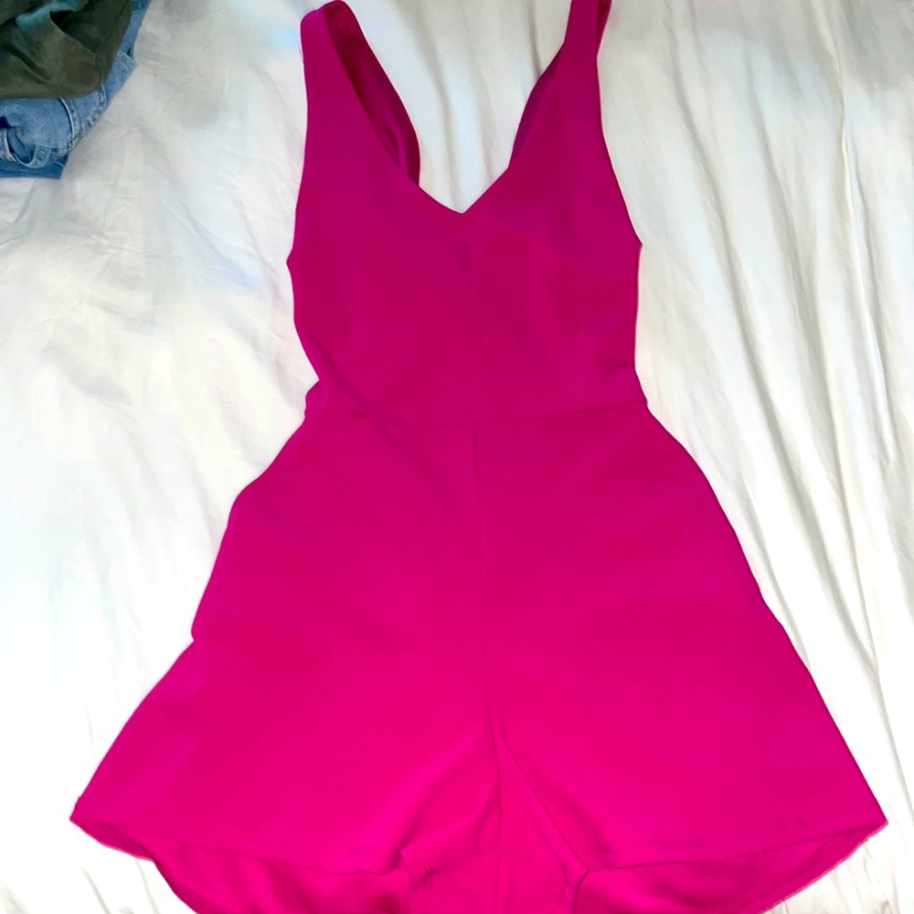 Pink open back romper, size L